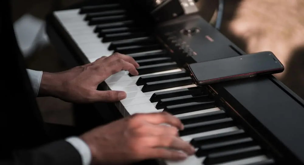 A classical pianist playing a top-rated digital piano, enjoying exceptional sound quality, realistic keyboard action, and advanced features.